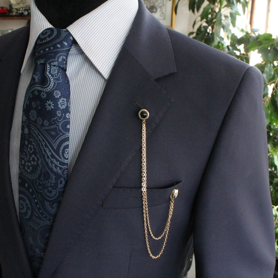 Pin on suit