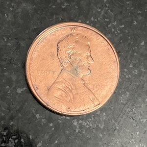 No Date Stamp Errors 19?? USA Error Coin Lincoln Penny Not Legible, Off Centered Stamping, Planchette Offset, Great Collectible! One Cent