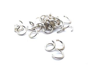 x100 Light Silver Open Junction Rings (Jump Ring) 7x1mm: AA0036