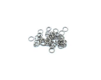x100 Dark Silver Open Junction Rings (Jump Ring) 5x1mm: AA0027