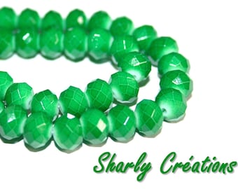 20 oval 8x6mm faceted dark green glass beads