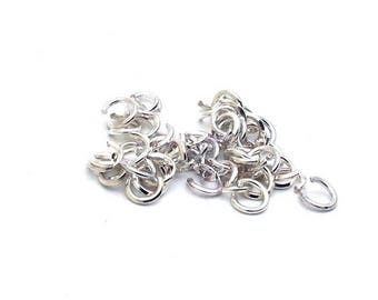 100 jumprings open diameter: 6mm, thickness: 1 mm clear silver