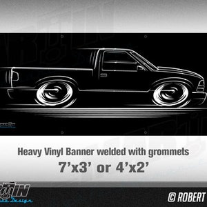 May include: A black and white line drawing of a pickup truck on a black background. The banner is made of heavy vinyl and has grommets. The banner is available in two sizes: 7 feet by 3 feet or 4 feet by 2 feet.