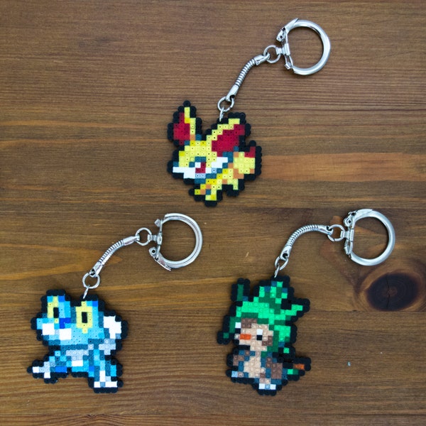 Fennekin, Froakie and Chespin Pokemon keychains, pins, magnets or earrings