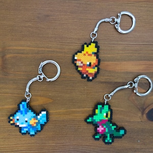 Mudkip, Treecko and Torchic keychains, pins, brooches, magnets or earrings