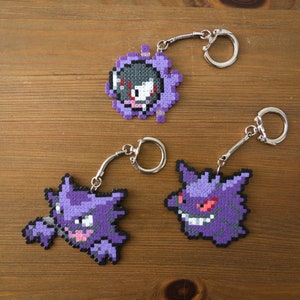 Gastly, Haunter and Gengar sleutelhanger, speld, broche, magneet of oorbellen