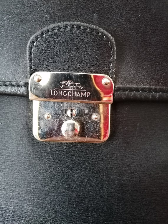 Porte documents Longchamp Paris homme cuir noir marque de luxe