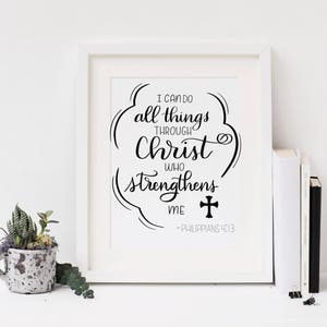May include: Black and white printable wall art with a quote from Philippians 4:13, "I can do all things through Christ who strengthens me".