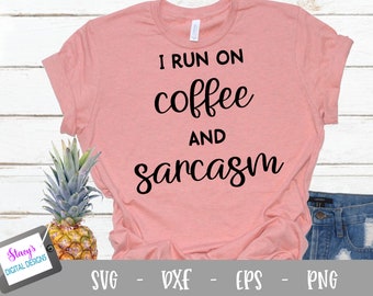 May include: A dusty rose short-sleeved t-shirt with black text that reads I RUN ON coffee AND sarcasm. The shirt is displayed alongside a pineapple and a small digital tablet screen showing the text Stacy's DIGITAL DESIGNS with SVG DXF EPS PNG.