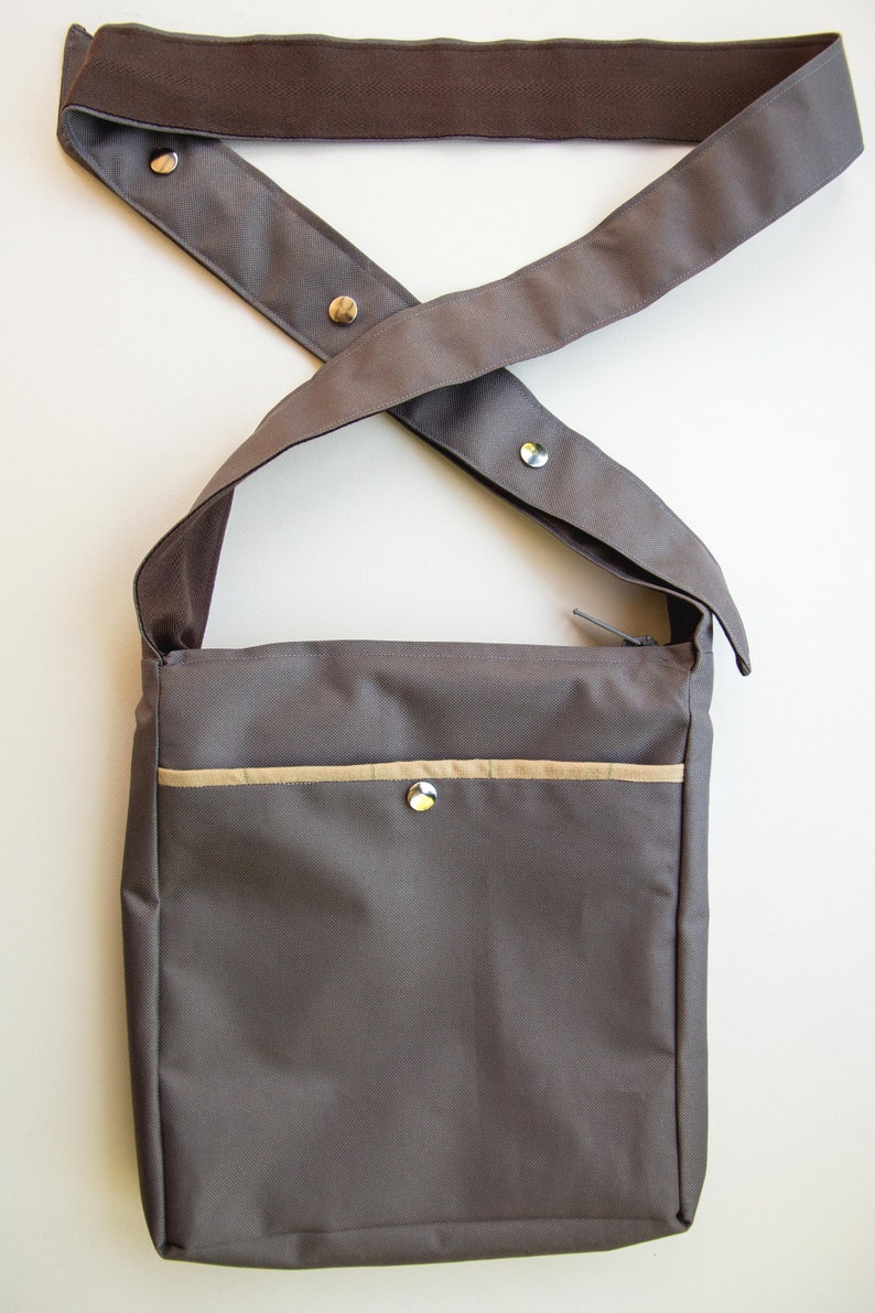 man bag with shoulder strap