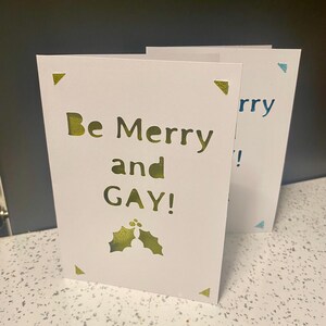 Be Merry and Gay - Carte de Noël (n'importe quelle couleur)