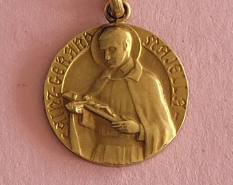 Stunning religious antique gold plated catholic medal pendant medallion holy charm of Saint Gerard Majella known as the patron of mothers.