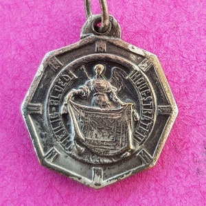 Beautiful religious antique silver plated Belgian medal pendant medallion holy charm of the Holy Blood in Hoogstraten, Belgium.