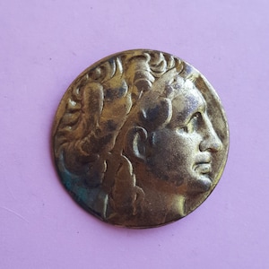 Beautiful antique French Art deco medal plaque bronze clip brooch of a man from the old world.