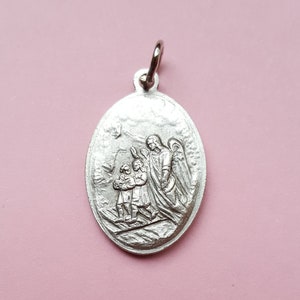Religious vintage catholic silvered medal pendant medallion of Saint Michael, Saint Michel the Archangel, Guardian angel.