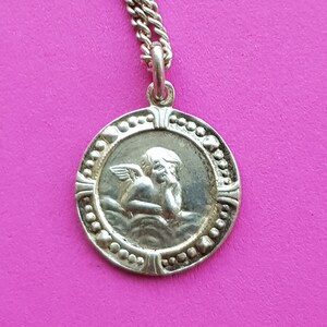 Precious stunning religious antique silver plated catholic medal pendant charm of a cherub, archangel, guardian angel complete with necklace