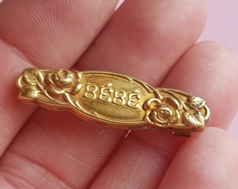 vintage,gold-plated,French Bebe,doll brooch or baby bib pin.