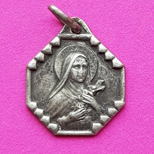 Stunning religious antique French silver plated catholic medal pendant holy charm medallion of Saint Thérèse of Lisieux.