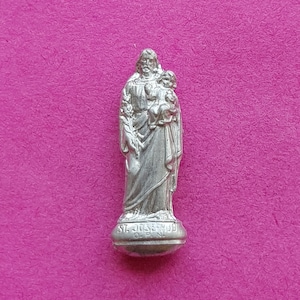 Religious antique silver plated French catholic pocket shrine relic relique with statue of Saint Joseph and Child Jesus.