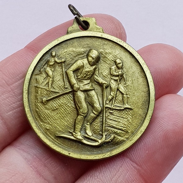 Beautiful bronze antique medal medallion charm pendant necklace of an alpinist, ski, skier, mountain, winter sports, cross country.