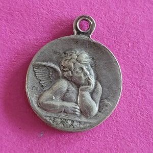 Religious silver plated medal pendant, holy charm, medaillon of the famous Raphael cherub (angel) guardian angel, Angel and Mary of Montaigu