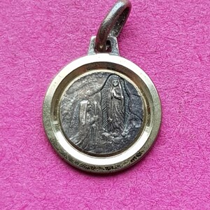 Religious French catholic silver plated medal pendant medallion holy charm of Holy Mary Our Lady of Lourdes, France.