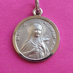 Antique religious French silver plated catholic medal pendant holy charm medallion of Saint Thérèse of Lisieux.