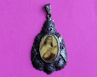 Very beautiful religious antique French silver plated catholic medal pendant holy charm medallion of Saint Therese of Lisieux.