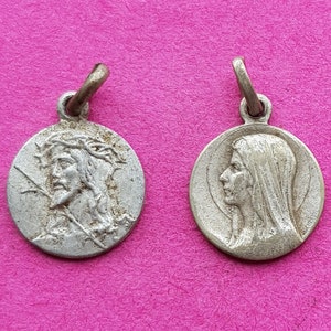 Lot of 2 antique silver plated medal pendant charms holy charm of Holy Mary of Lourdes, Holy Christ, Cross of Jerusalem.