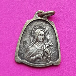 Beautiful religious antique French silver plated catholic medal pendant holy charm medallion of Saint Thérèse of Lisieux.