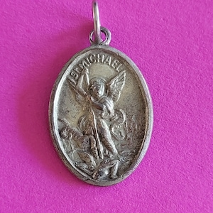 Beautiful religious antique catholic silvered medal pendant medallion of Saint Michael, Sint Michel the Archangel, Guardian angel.