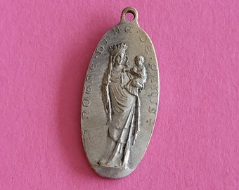 Religious antique French silvered catholic holy charm medal pendant of Holy Mary with Child Jesus, Notre Dame de Paris.