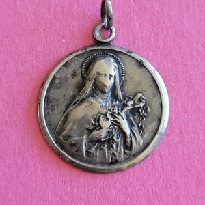 Beautiful religious antique French silver HALLMARKED catholic medal pendant holy charm medallion of Saint Thérèse of Lisieux.