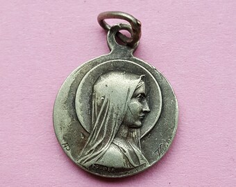 Religious antique silvered catholic medal pendant medallion of Holy Mary our Lady, Virgin Mary and Holy Mary our Lady of Hal in Belgium.