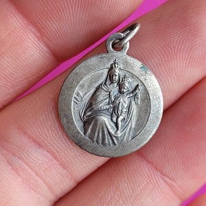 Stunning religious catholic antique silver plated holy charm medal pendant of Virgin Mary Scapular and Child Jesus.
