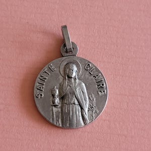 Religious catholic silvered medal pendant holy charm of Sainte Claire, Saint Clara, Sancta Clara O.P.N, Saint Clara of Assisi, Italy.