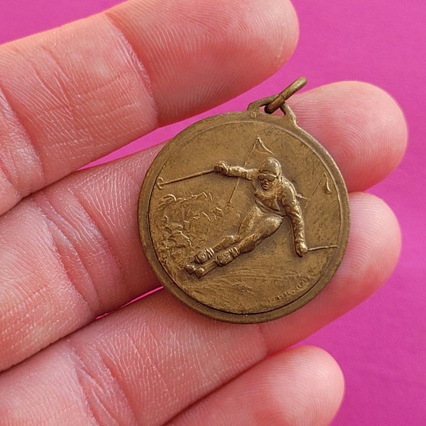 Beautiful bronze antique medal medallion charm pendant necklace of an alpinist, ski, skier, mountain, winter sports, cross country.