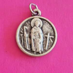 Religious antique silver plated French catholic medal pendant, holy charm, medallion with third class relic of Saint Peregrine Laziosi.