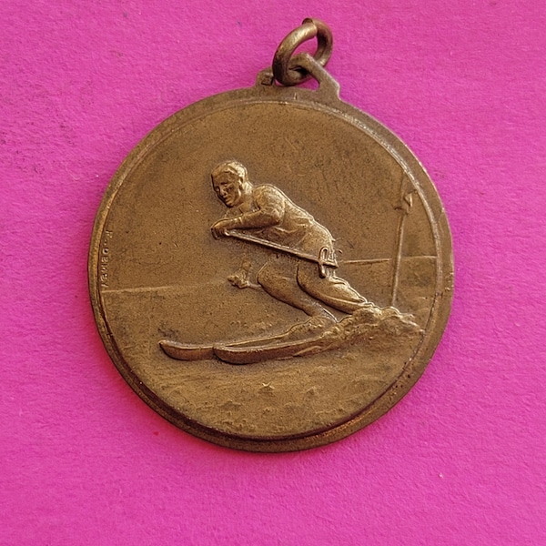 Beautiful bronze antique medal medallion charm pendant necklace of an alpinist, ski, skier, mountain, winter sports, cross country.