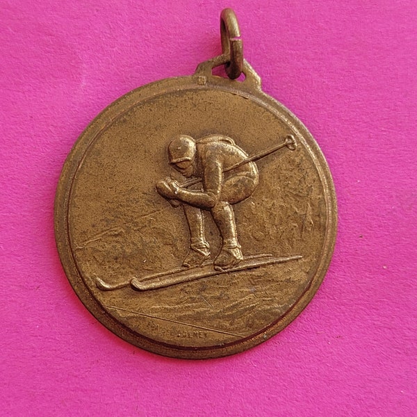 Beautiful bronze antique medal medallion charm pendant necklace of an alpinist, ski, skier, mountain, winter sports, cross country.