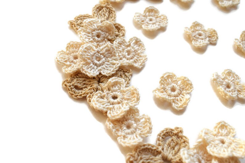 Decor clothes. Sewing applique Crochet flowers