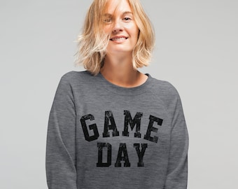 May include: A heather grey sweatshirt with the text "GAME DAY" printed in black.