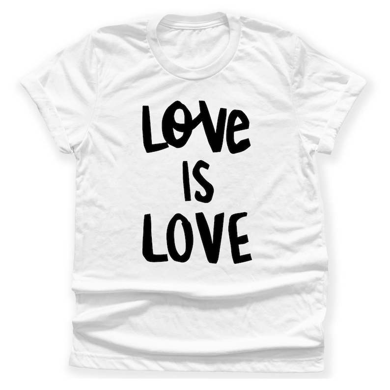 May include: White t-shirt with black text that reads "Love is Love" in a bold, handwritten style.