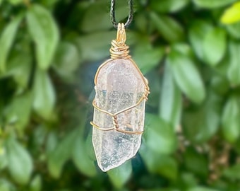 Clear Quartz Point Necklaces
