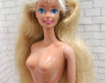 Barbie Mattel Vintage de los años 80 en dos tonos color canela con giro y rodillas con efecto "Sun Splash"