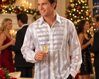 May include: A long-sleeved button-down shirt featuring alternating vertical stripes of white fabric and shimmering silver metallic panels. The shirt has a classic collar, a buttoned front placket, and buttoned cuffs, crafted from a lightweight material.