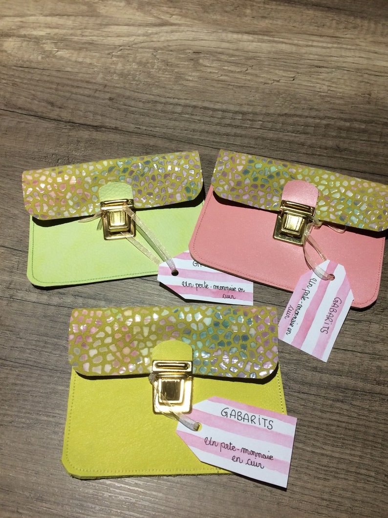Yellow leather wallet and scales