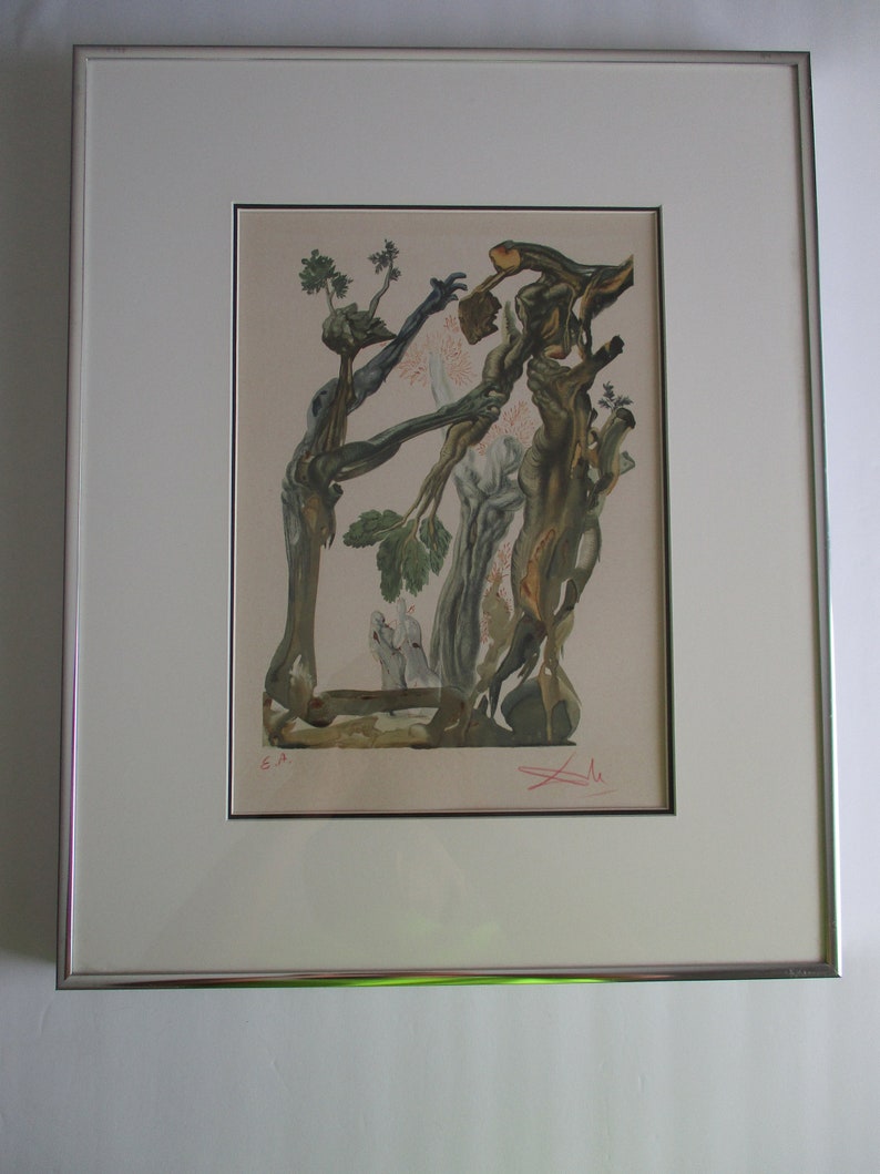 May include: A framed print of a surrealist artwork featuring a tree with intertwined branches and figures. The artwork is in shades of brown, green, and blue, with a white background. The print is signed "Dali" in the bottom right corner.