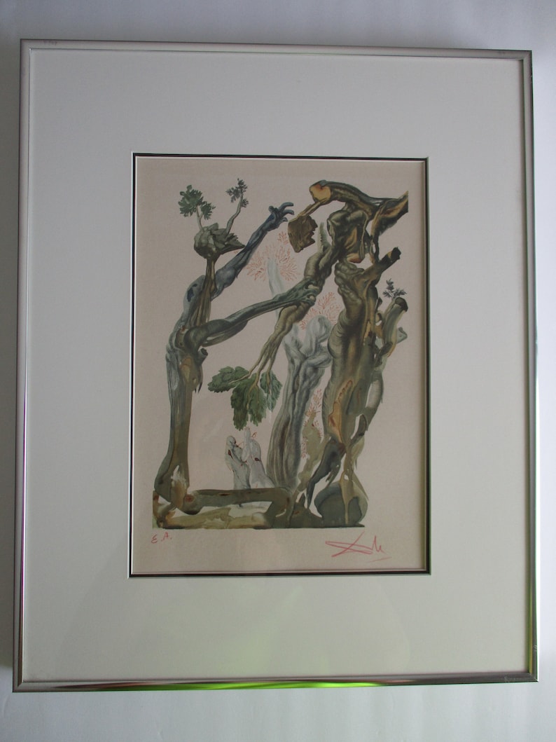 May include: A framed print of a surrealist artwork by Salvador Dali. The print features a complex composition of intertwined branches, figures, and a small dog. The artwork is rendered in shades of green, brown, and white, with a signature in the bottom right corner.