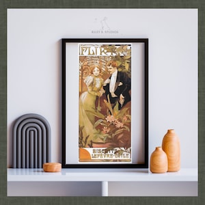 May include: A framed vintage poster advertising "FLIRT" biscuits by Lefèvre-Utile. The poster features a couple in a garden setting with a floral design and the text "FLIRT" in a decorative font.